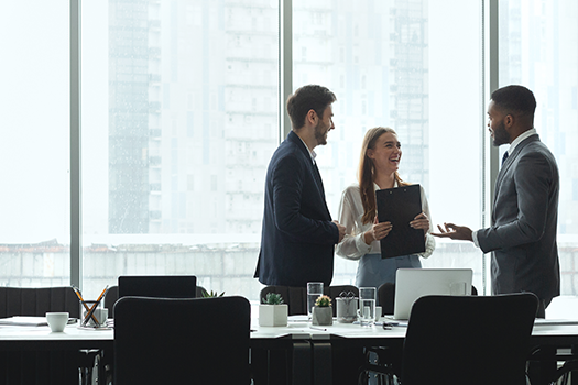corporate team meeting by big window