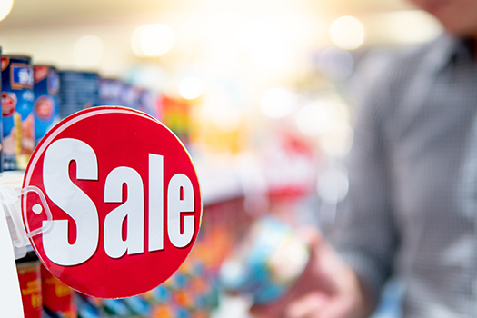 sale sign in grocery store