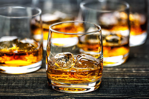 glasses of dark alcohol