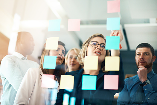 teammates brainstorming in office